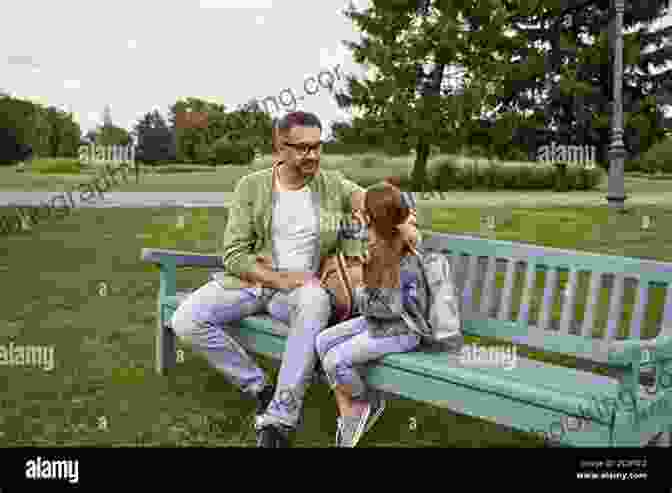 A Father And Daughter Sitting On A Bench Talking 10 Ways To Make Sure That You Are Being A Good Parent