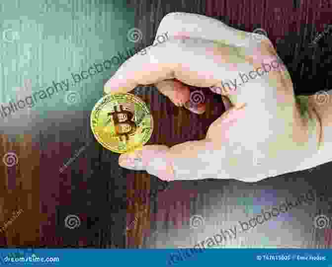 A Person Holding A Cryptocurrency Coin, Representing The Wealth And Financial Freedom It Can Bring. Gold 2 0: Opening The Vault To The Secrets Of Cryptocurrency