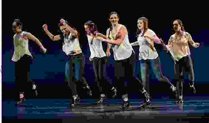 A Photo Of An Ensemble Performing A Complex Dance Routine On Stage. Broadway Swings: Covering The Ensemble In Musical Theatre