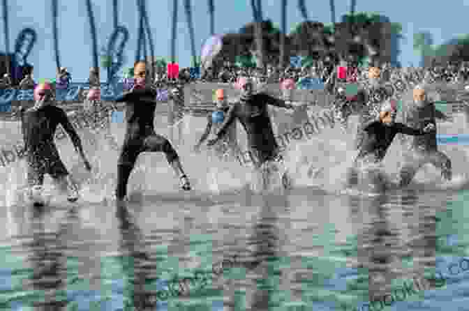 A Photograph Of Triathletes Plunging Into The Ocean At The Start Of The Ironman Triathlon Swim. Iron War: Dave Scott Mark Allen And The Greatest Race Ever Run
