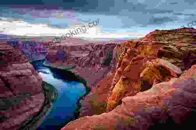 A Vibrant Photograph Of The Grand Canyon's Painted Cliffs And The Colorado River Winding Through Them Grand Canyon: The Complete Guide: Grand Canyon National Park (Color Travel Guide)
