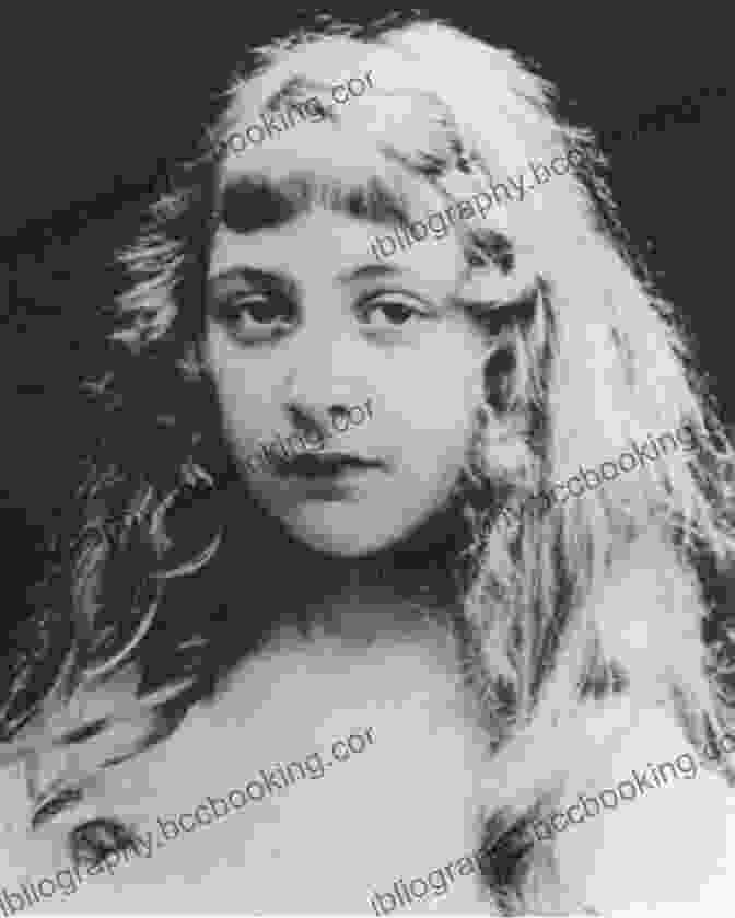 A Young Agatha Christie As A Child, Showcasing Her Piercing Eyes And Determined Expression. Agatha Christie: A Mysterious Life